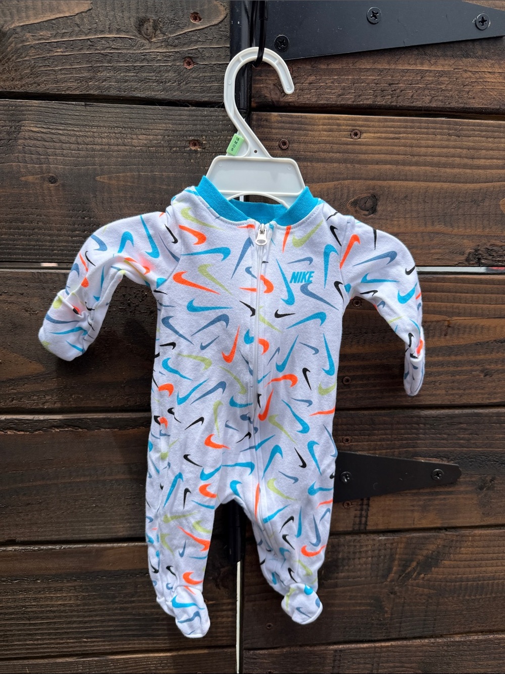 Nike Newborn colorful swoosh Footed One-Piece with built in mittens